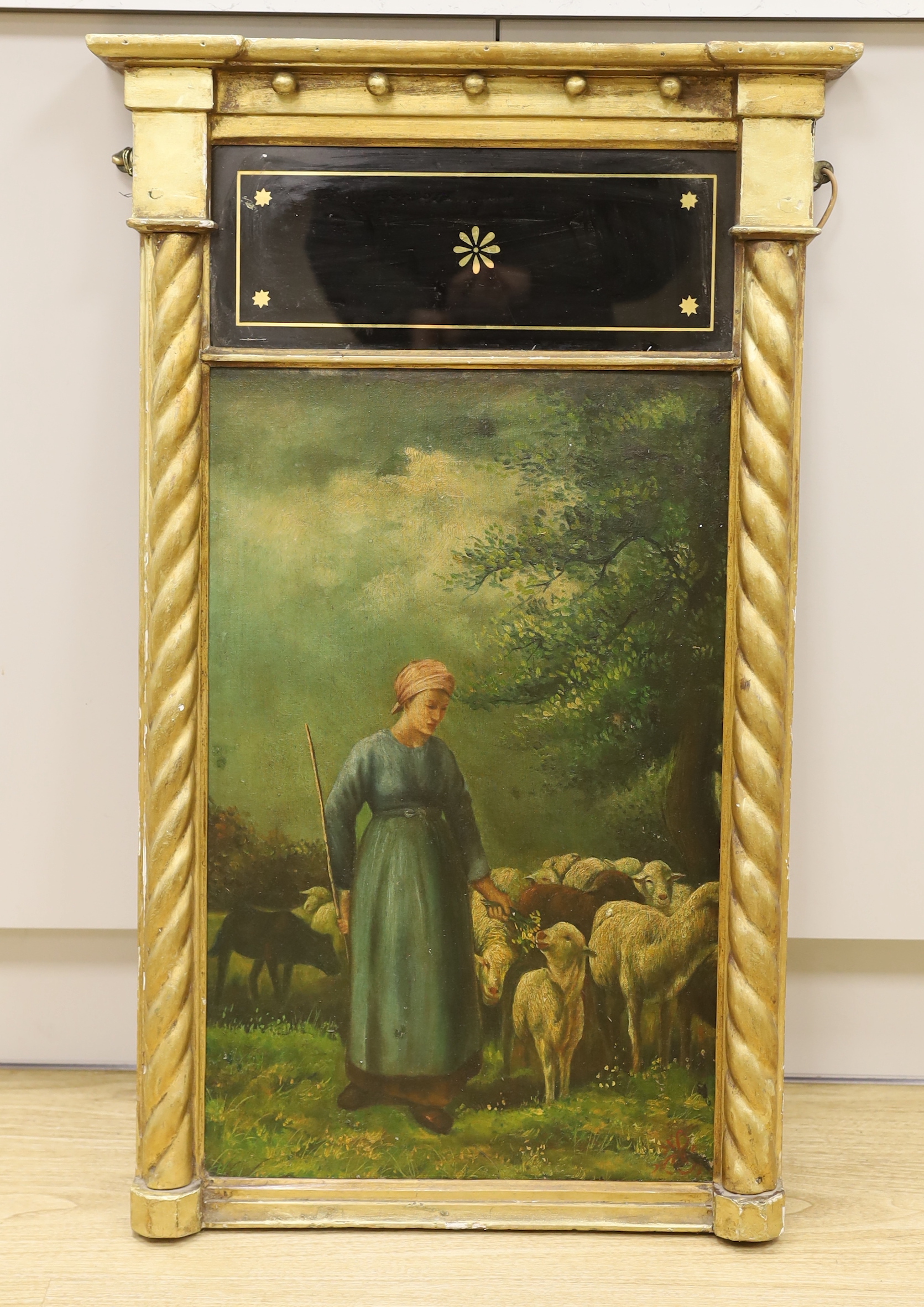 A Pre-raphaelite style oil on board, Shepherdess and sheep, 60 x 38cm, housed in a gilt and glass frame